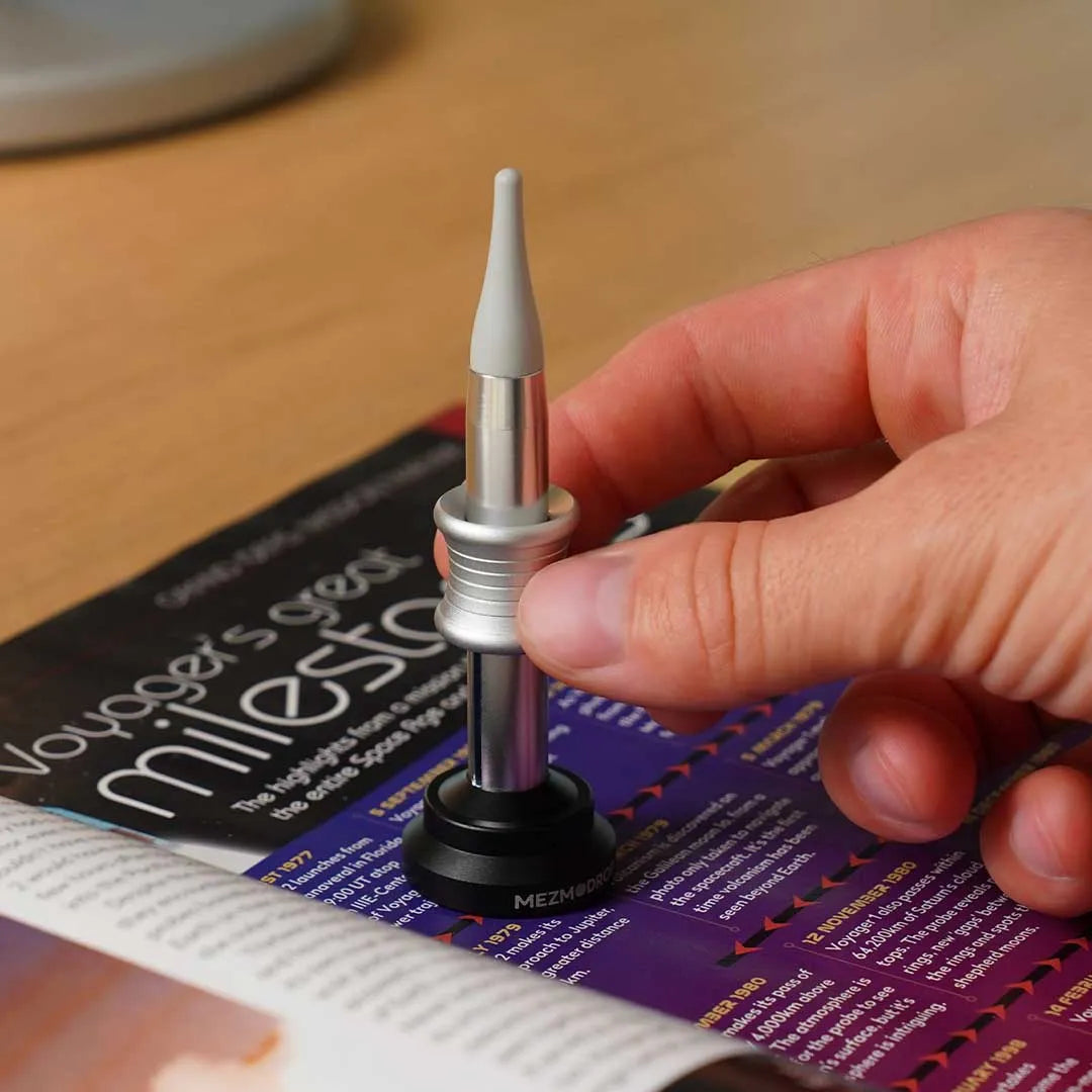 A kinetic desktop toy capable of pulling off an "impossible landing."