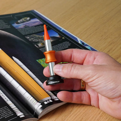 A kinetic desktop toy capable of pulling off an "impossible landing."