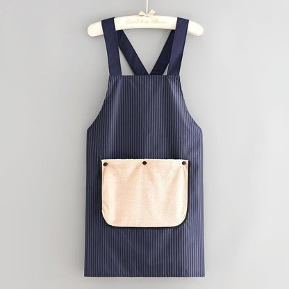Unisex apron with pockets, featuring a cross-back strap design and including a towel